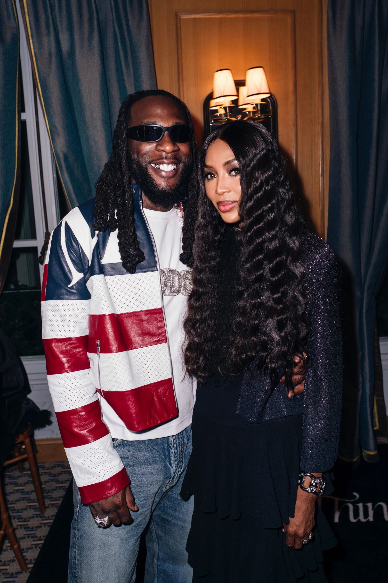 Two guests at PrettyLittleThing’s rebrand in Paris, photographed by German Larkin.